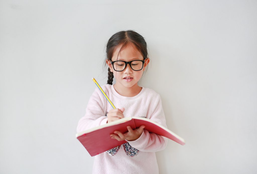 girl writing down the services on offer